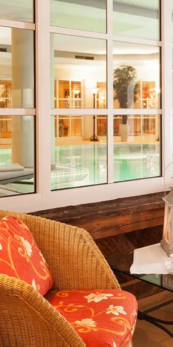 Cozy seating area with elegant design and vibrant decor at Hotel Tirolerhof.