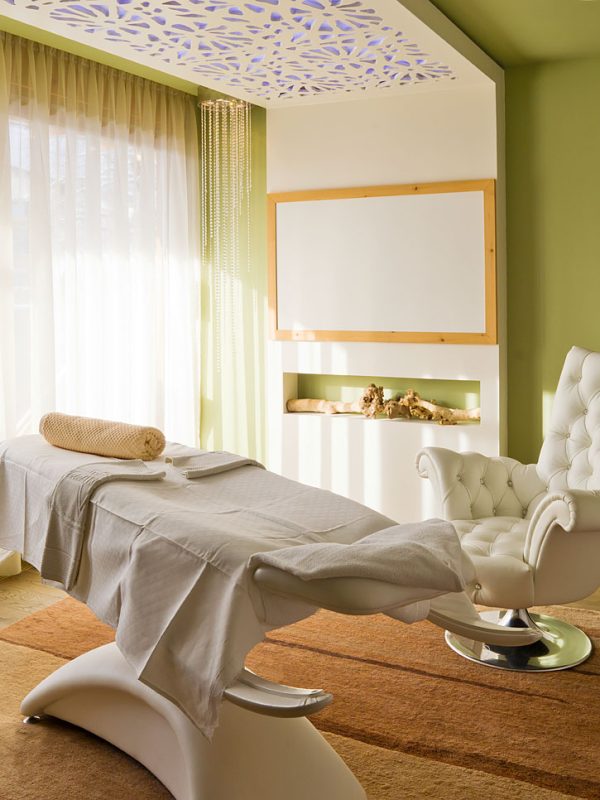 Elegant massage and therapy room with comfortable seating and natural lighting in the Hotel Tirolerhof